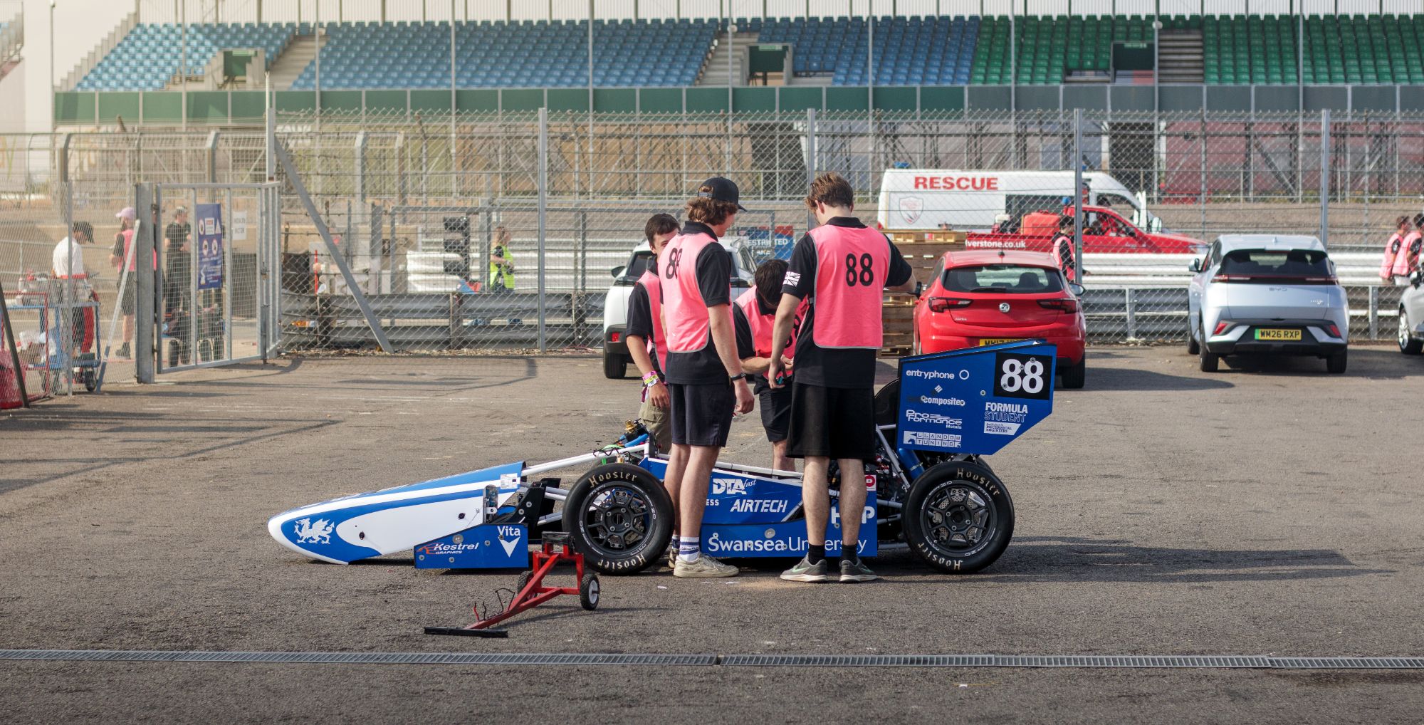 Swansea University Race Engineering team working on the car at Silverstone